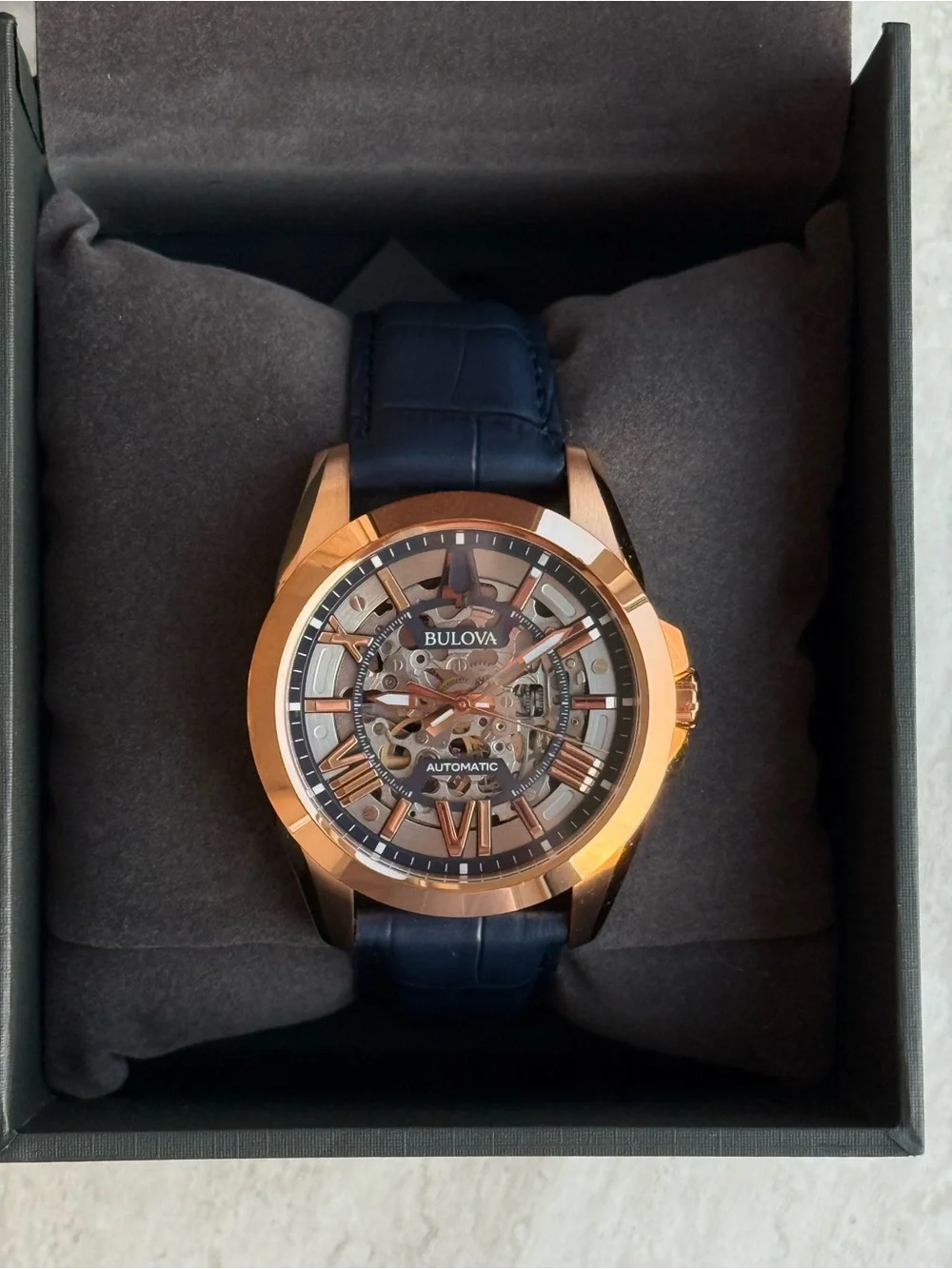 Bulova Rose Gold Case with Blue Leather Accents Watch